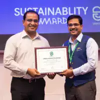 EcoChefBamboo receiving the Green Innovation Award for sustainable bamboo kitchenware production and environmental conservation efforts in Northeast India