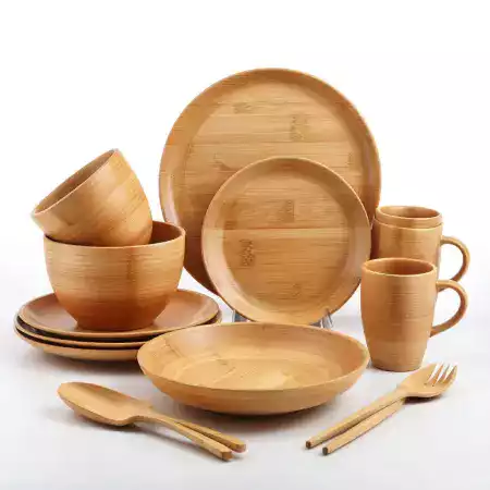 Complete premium bamboo kitchenware collection featuring handcrafted spoons, spatulas, cutting boards, and serving utensils from EcoChefBamboo